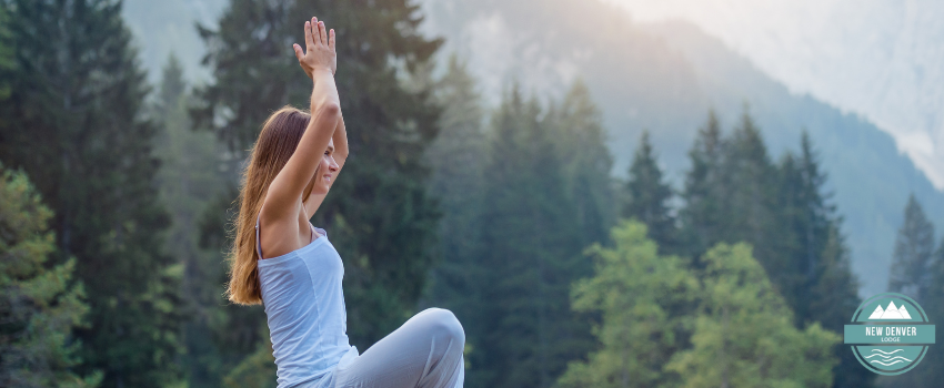 NDL - Woman practicing yoga in mountains 