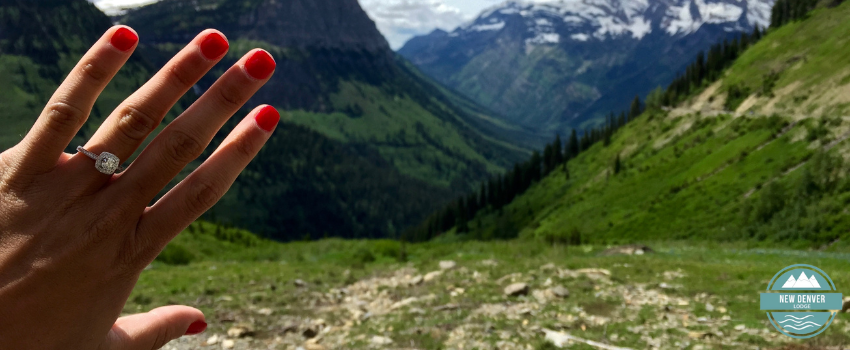 NDL - Woman wearing engagement ring with mountain background